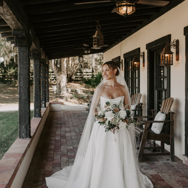 la hacienda snow hill bride spanish colonial porch wedding portrait 1
