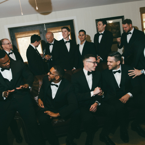 la hacienda snow hill groom groomsmen getting ready black tuxedos