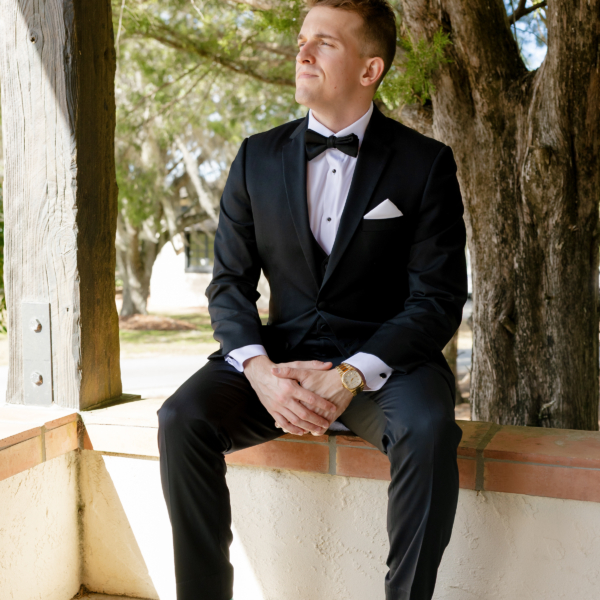 la hacienda snow hill groom portrait black tuxedo outdoor wedding