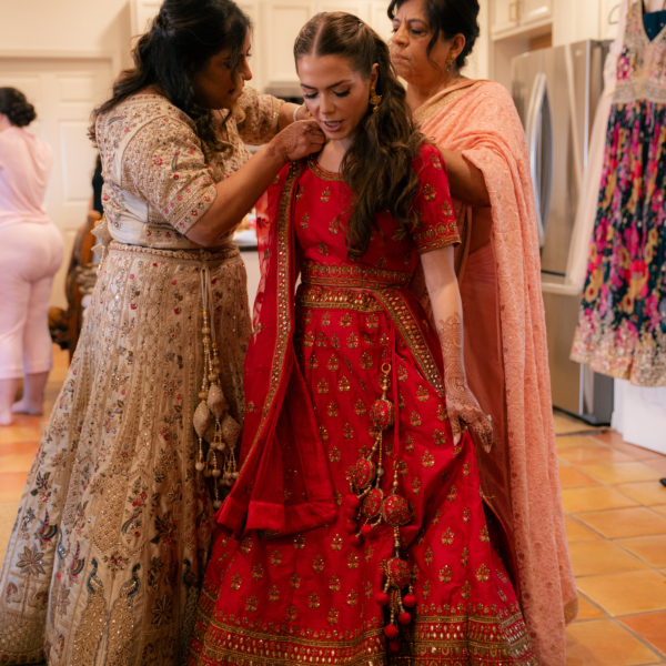 la hacienda snow hill indian wedding bride getting ready red lehenga