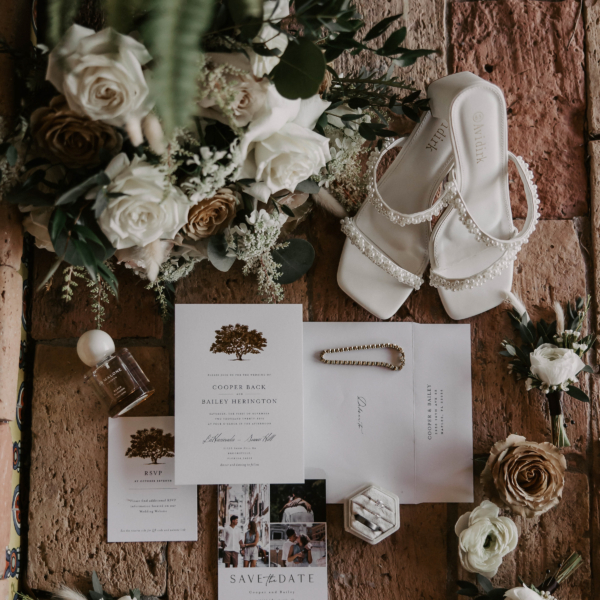 la hacienda snow hill wedding details invitation suite bridal shoes bouquet