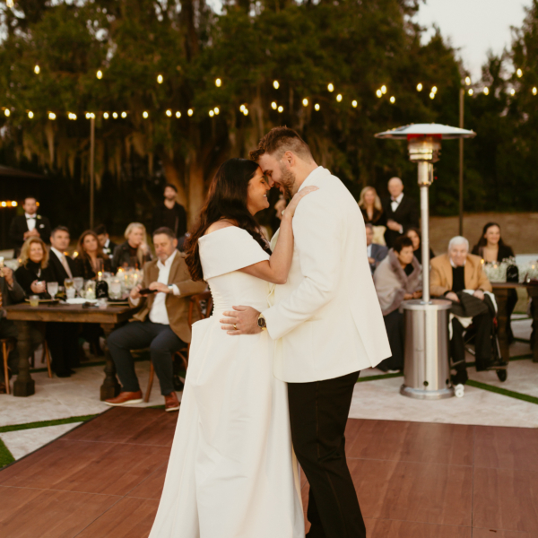 la hacienda snow hill wedding first dance string lights outdoor reception