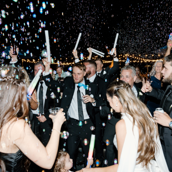 la hacienda snow hill wedding reception glow stick bubble exit celebration