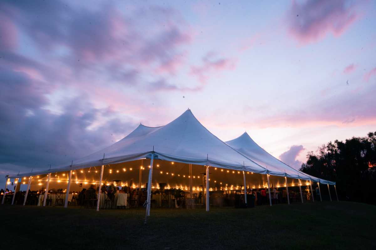 la hacienda snow hill wedding tent sunset string lights reception